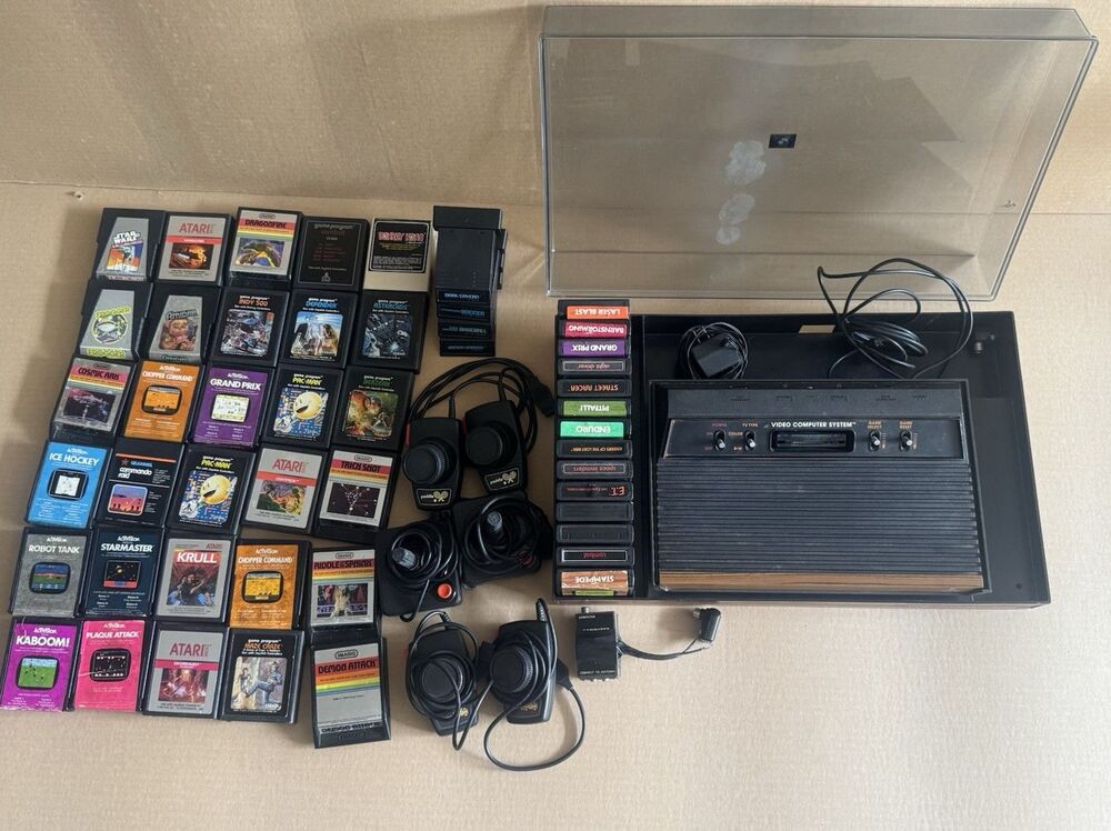 VTG Atari 2600 Console 2 Joystick 3 Paddle & 48 Games Bundle Lot Untested